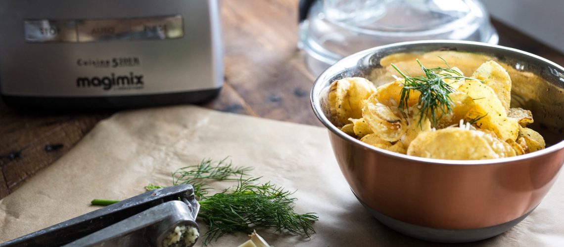 Homemade potato chips in a nice bowl.